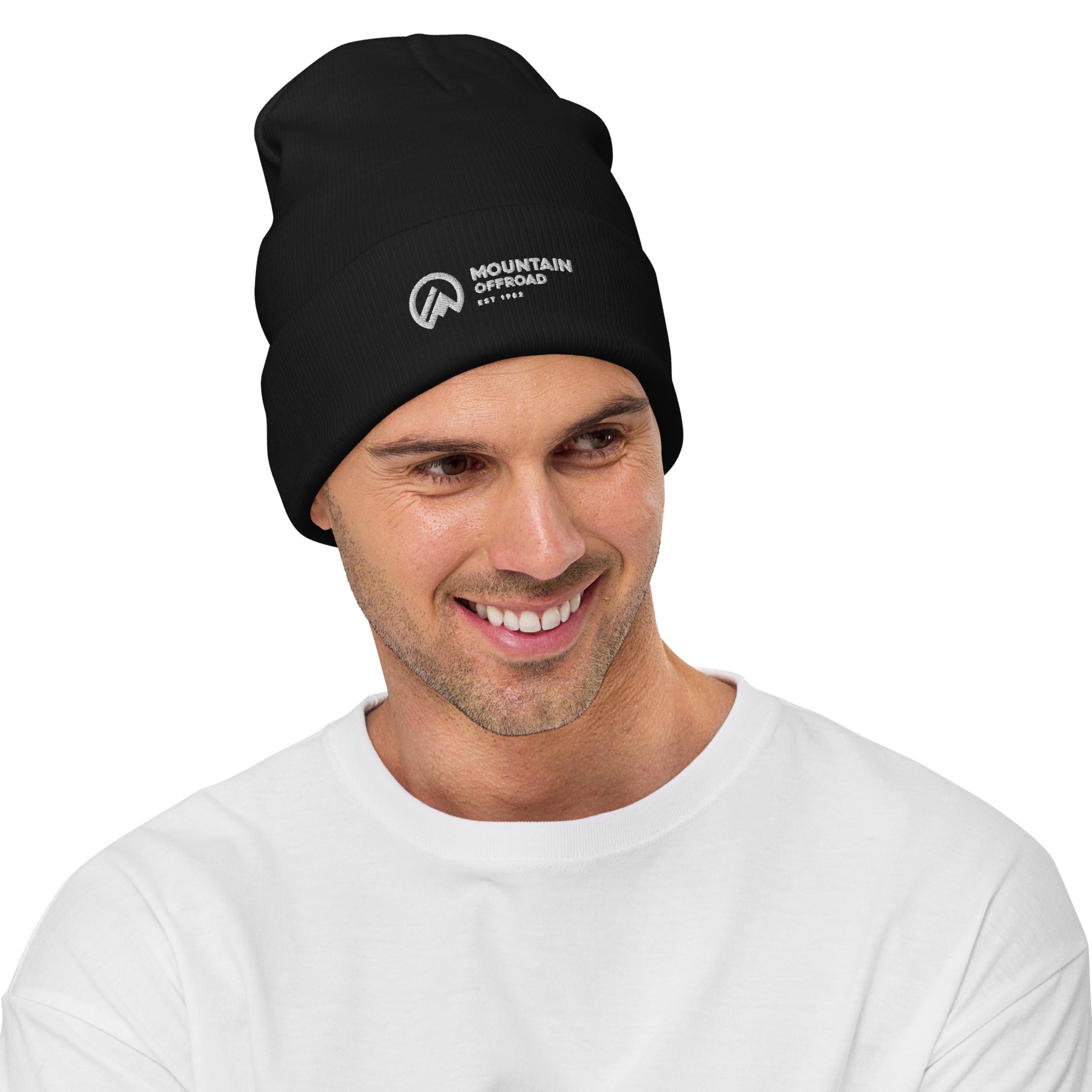 Man wearing black Mountain Offroad beanie, cozy winter hat for outdoor adventure.