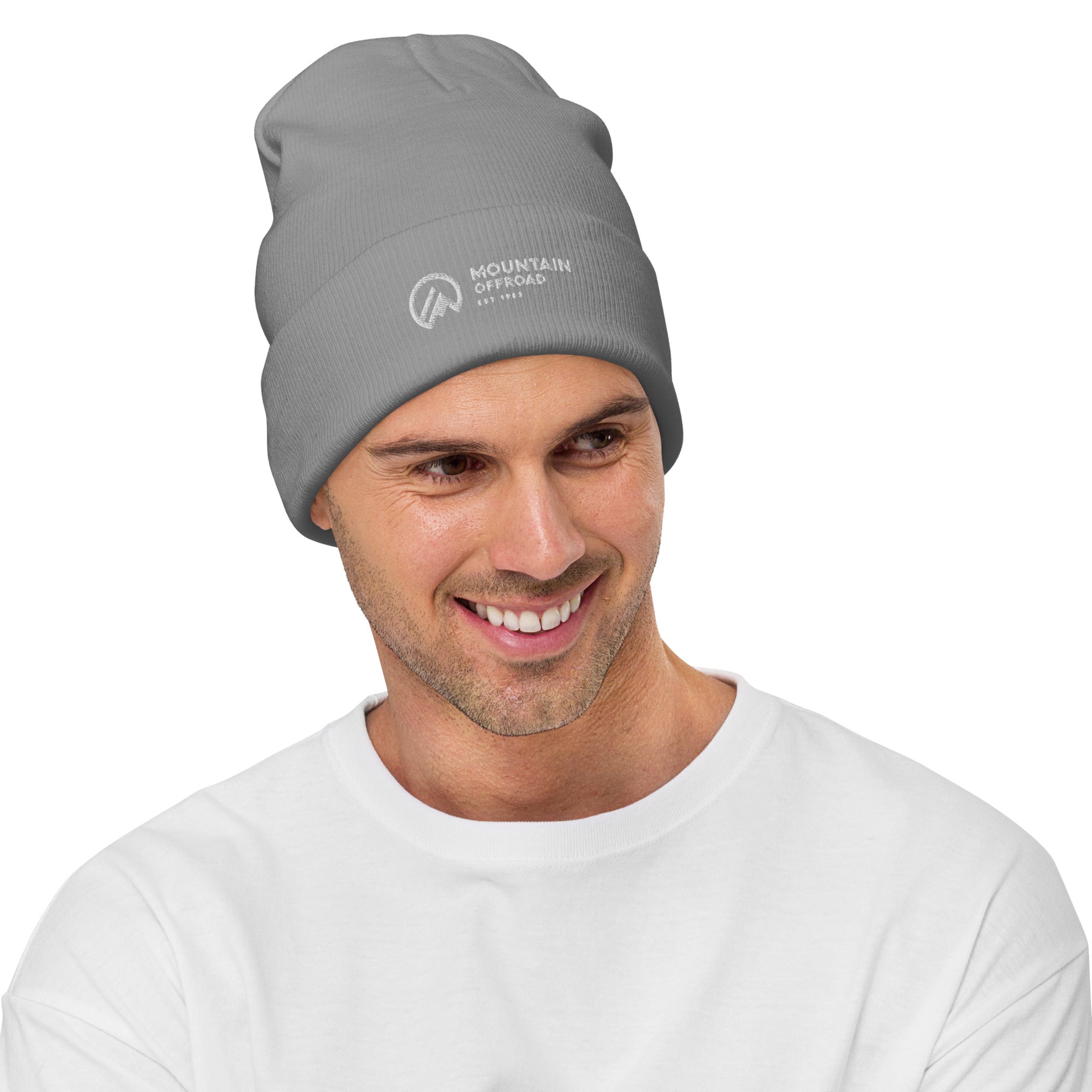 Man wearing a gray Mountain Offroad beanie, ideal for camping and outdoor adventures
