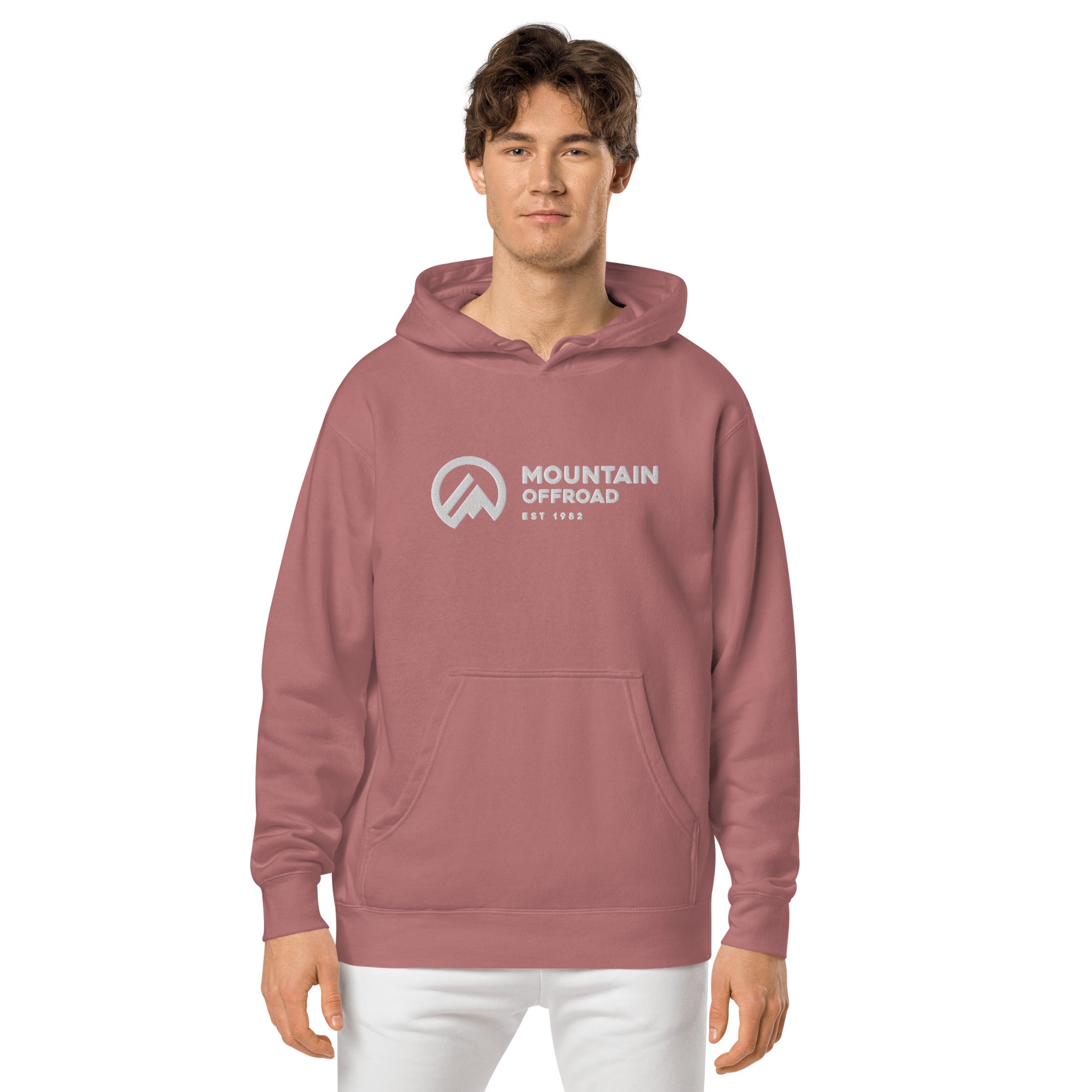 Man wearing vintage pigment dyed hoodie with Mountain Offroad logo, adventure apparel