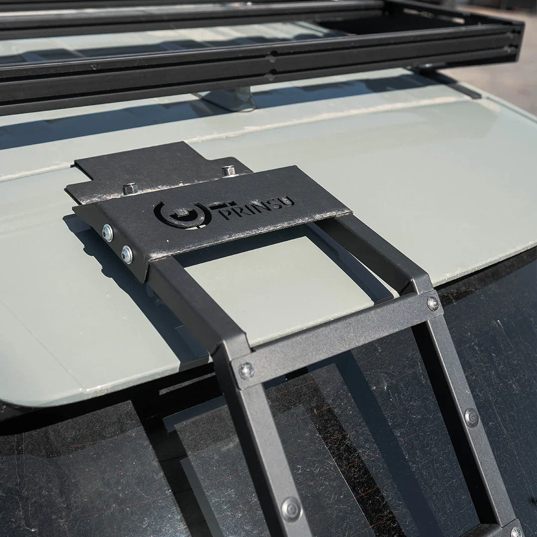 Heavy-duty roof ladder mounted on Toyota RAV4 for overlanding and camping gear access