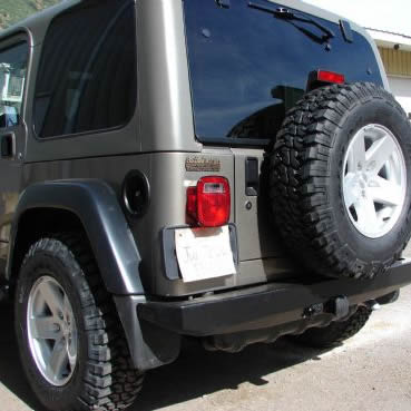Rock-proof rear bumper with clevis mounts on Jeep Wrangler TJ, off-road accessory
