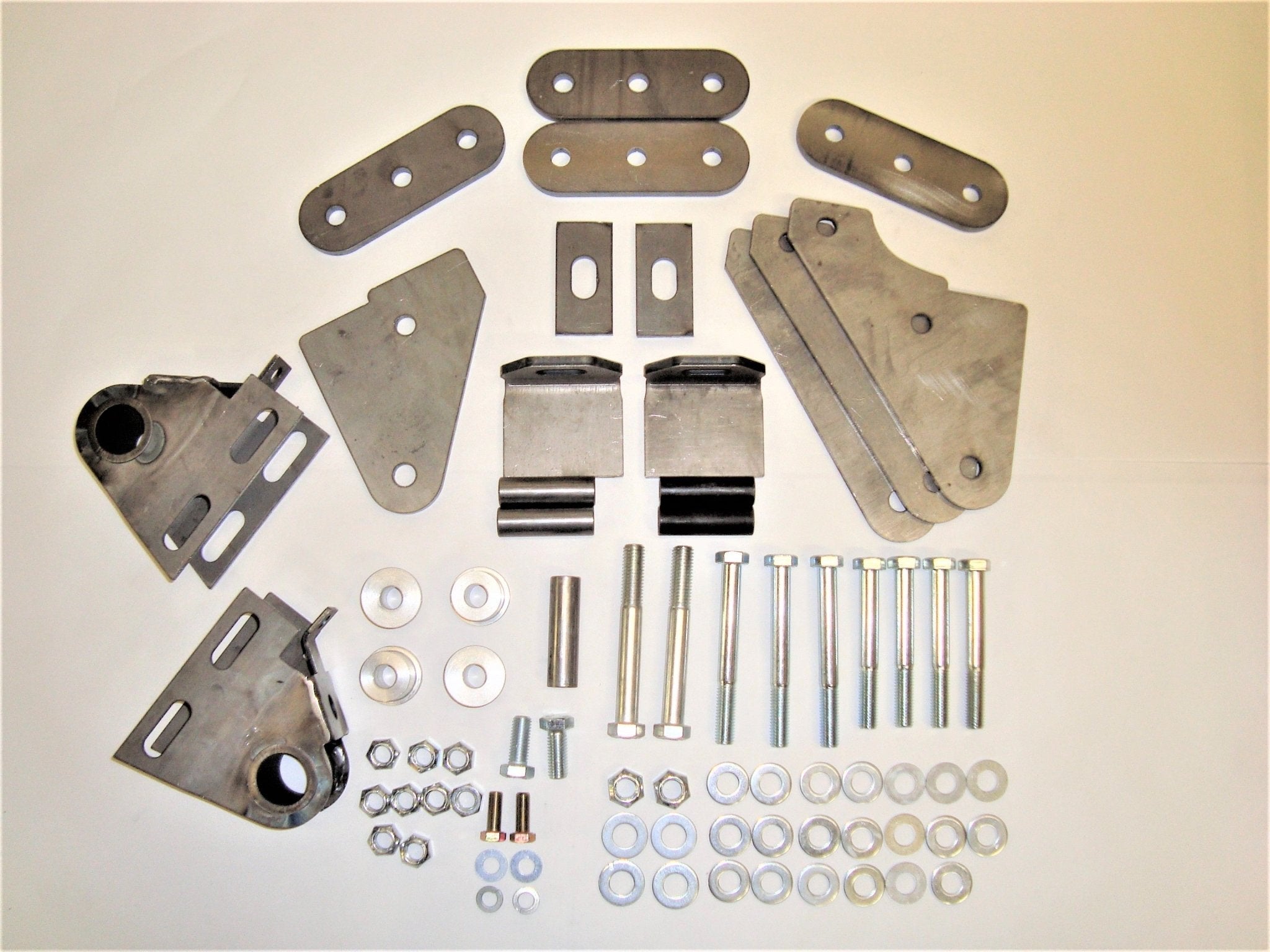 Shackle reversal system with bolt-on spring hanger brackets and hardware for Jeep Wrangler YJ 1987-1995