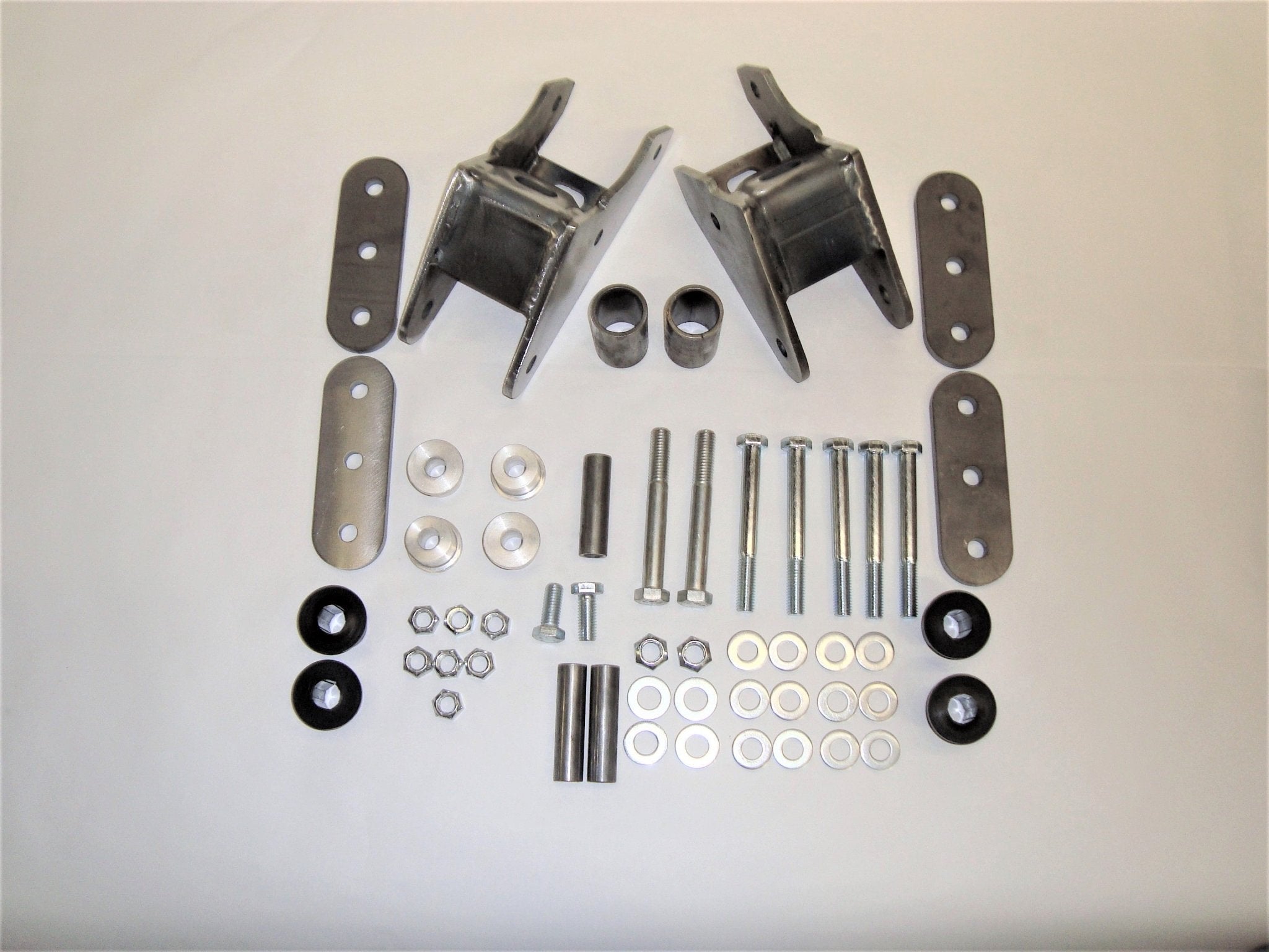 Shackle reversal system with weld-in shackle hangers and hardware for Jeep Wrangler YJ 1987-95