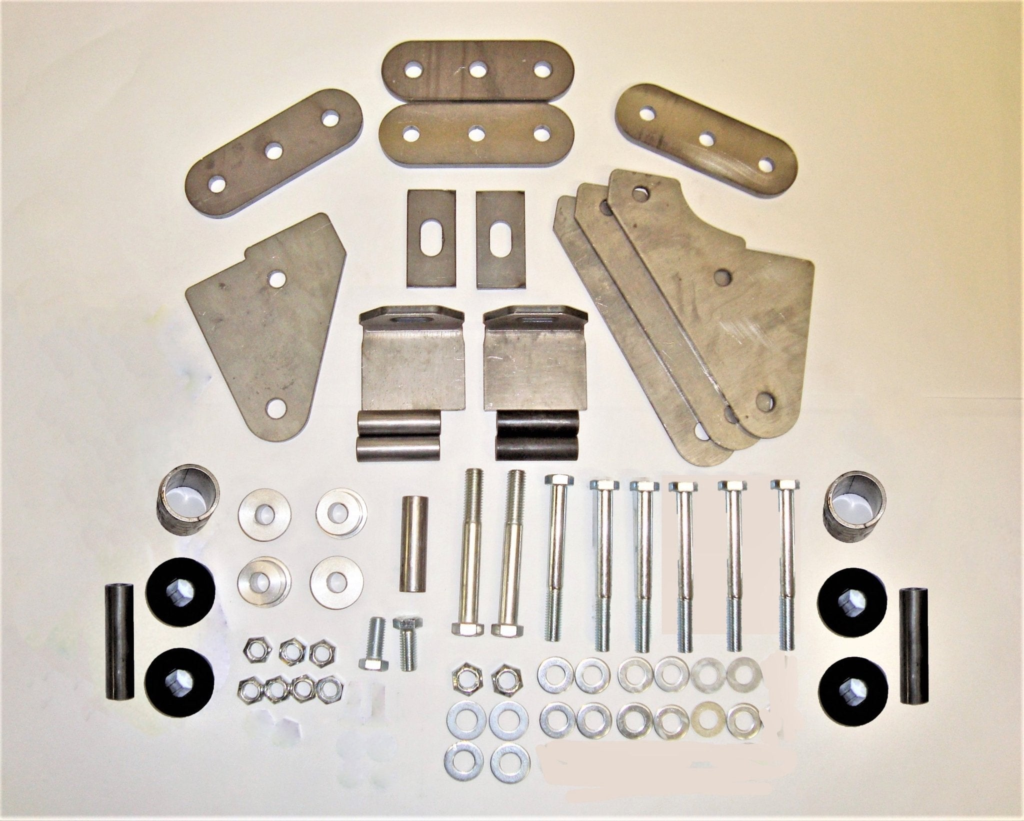 Shackle reversal system kit with weld-in shackle hangers and hardware for Jeep Wrangler YJ