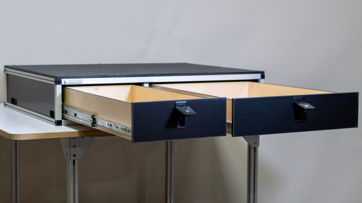 Goose Gear side-by-side drawer module with both drawers pulled wide open showing birch plywood interiors