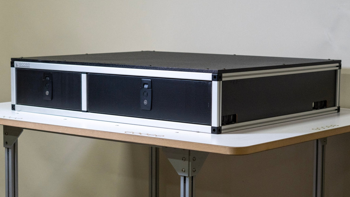 Goose Gear side-by-side drawer module with both drawers closed, silver aluminum frame and black latches