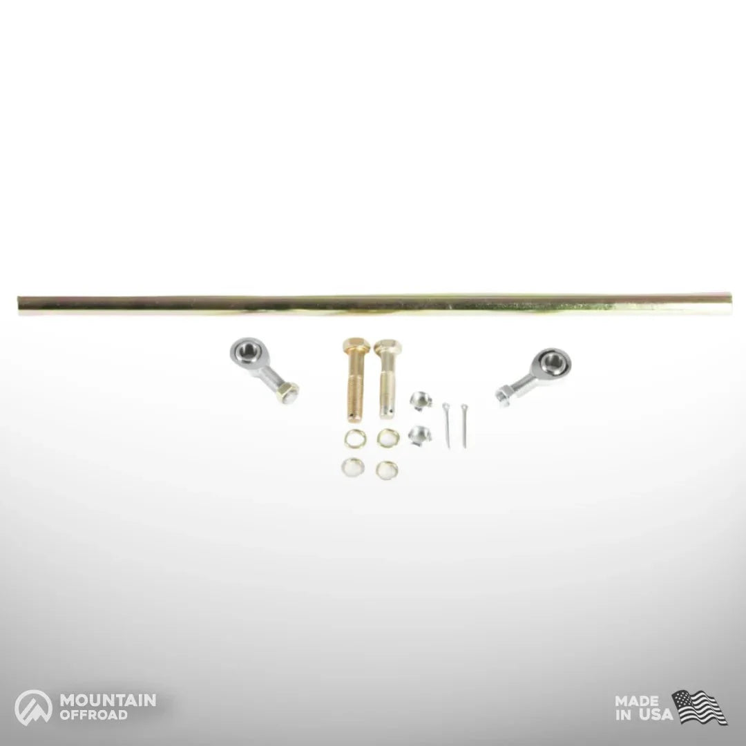 Steering link kit and tie rod components for Jeep CJ 1982-86, hardware laid out on white background