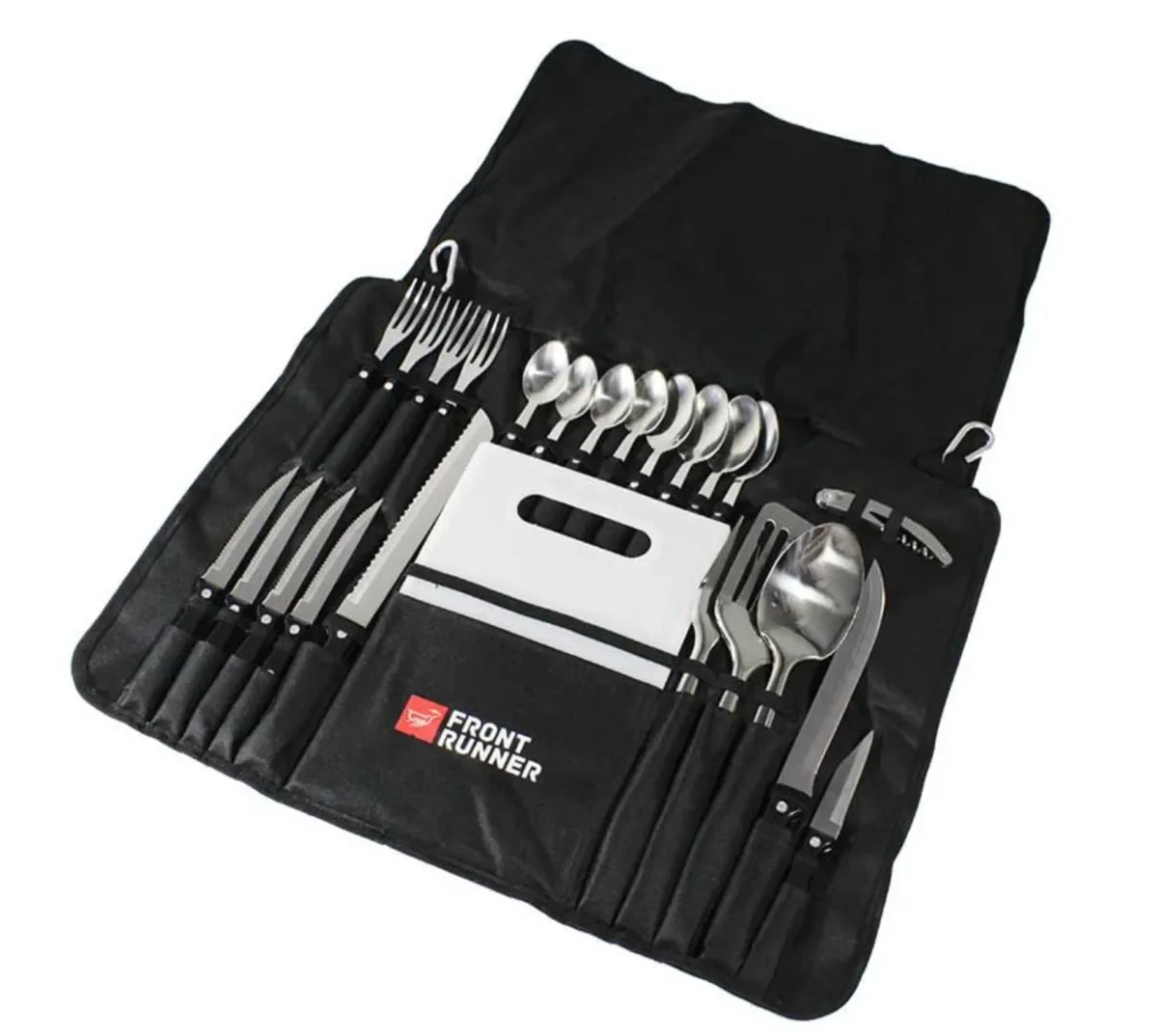 Camping utensil set with cutlery, knives, cutting board, and tools in a portable black case