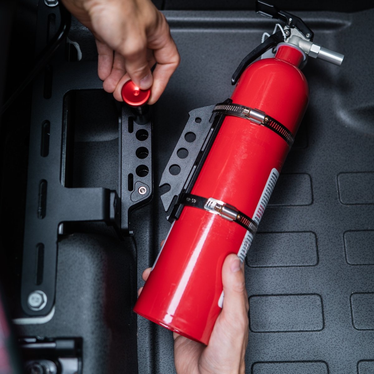 under-seat-fire-extinguisher-mount-for-ineos-grenadier-1246192 - NVMOS