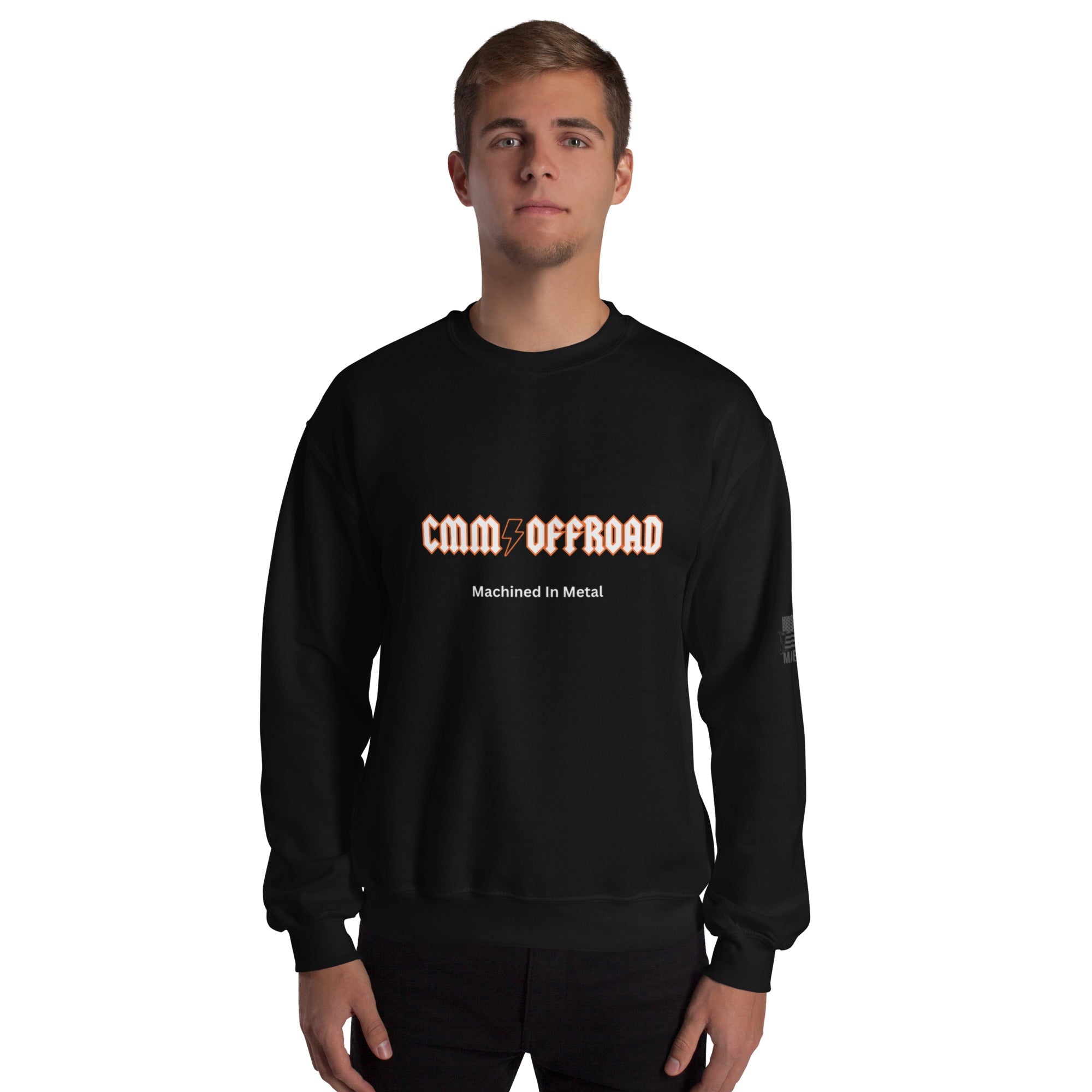 Man wearing black unisex crew neck sweatshirt with 'CMM Offroad Machined In Metal' text on front