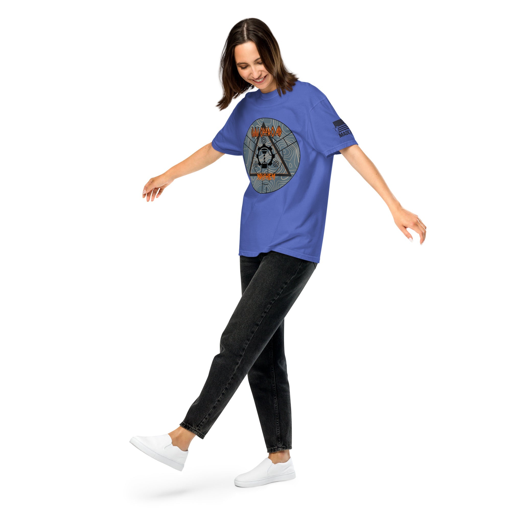 Woman wearing flo blue unisex heavyweight t-shirt with adventure gear graphic design