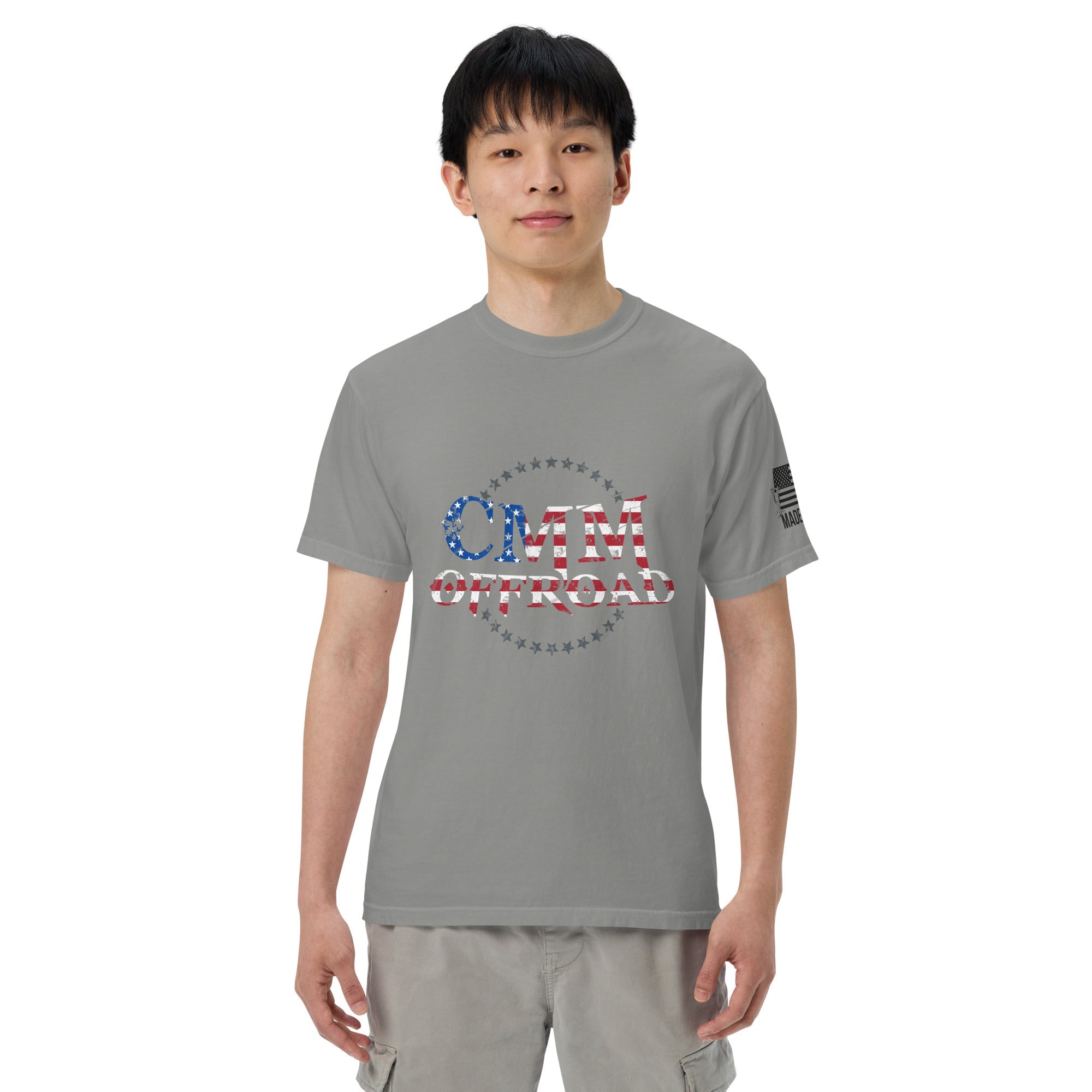 Unisex grey heavyweight t-shirt with 'CMM Offroad' USA flag graphic on front and sleeve print.
