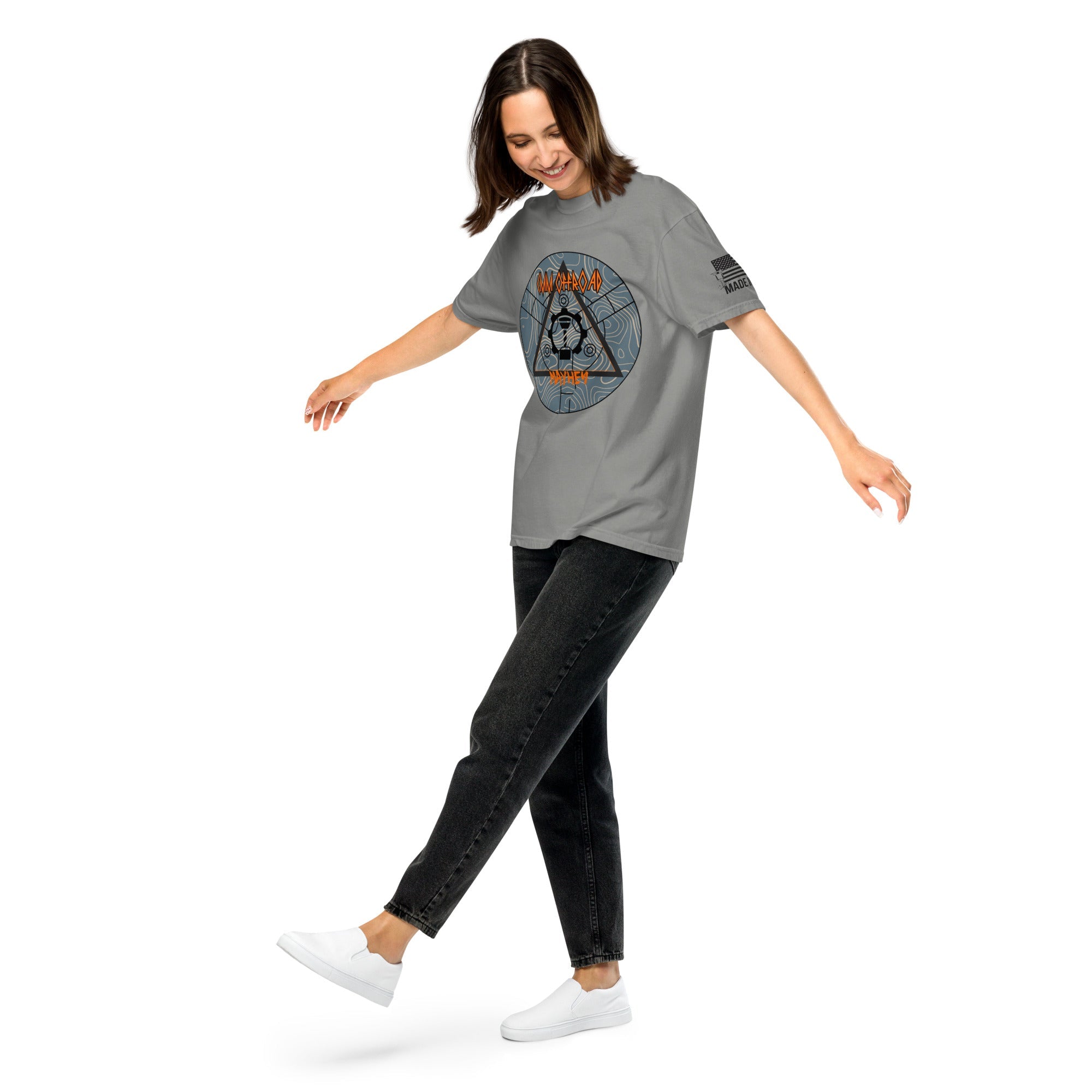 Woman wearing grey unisex garment dyed heavyweight t-shirt with adventure graphic print