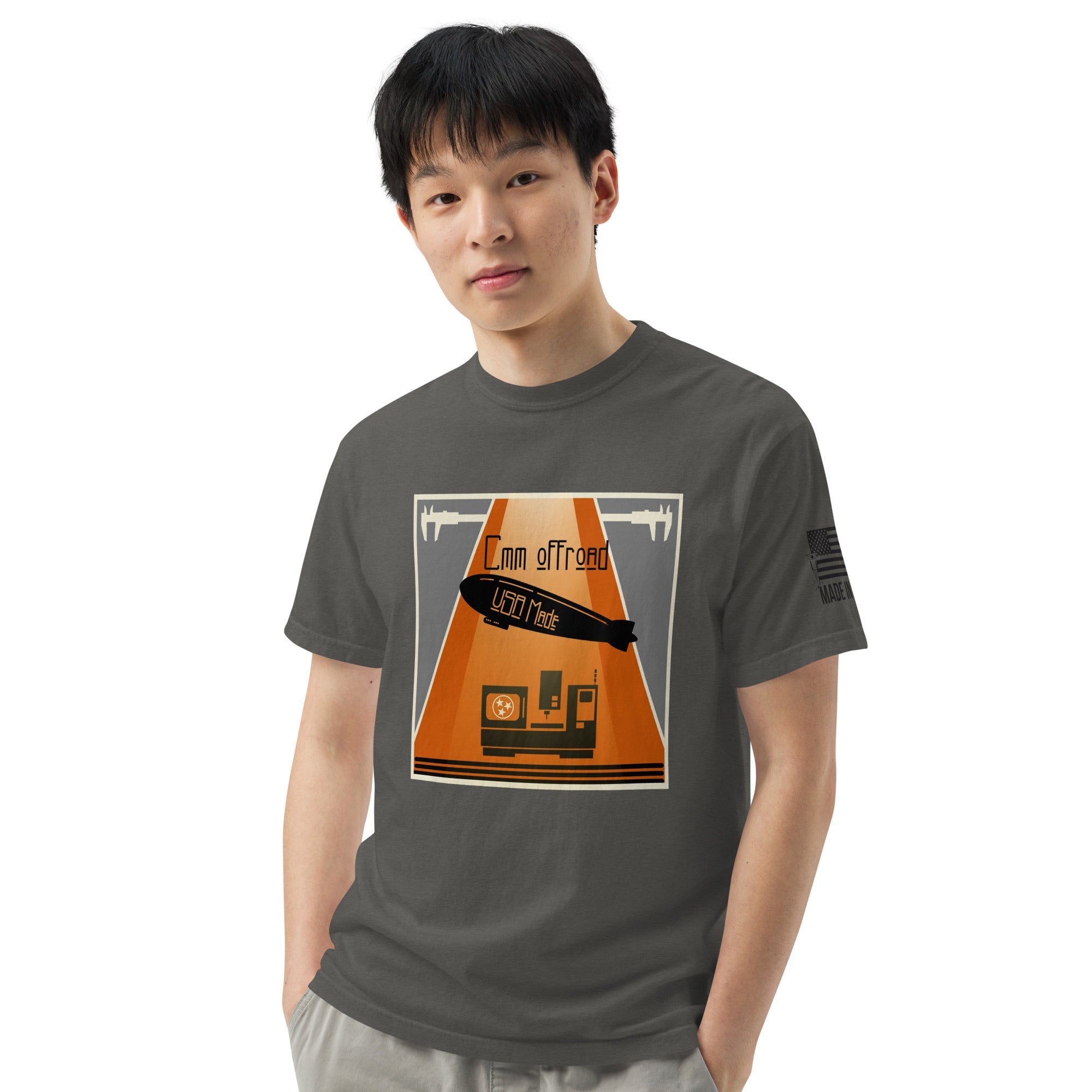 Unisex garment-dyed heavy cotton t-shirt in pepper color with offroad adventure graphic on front