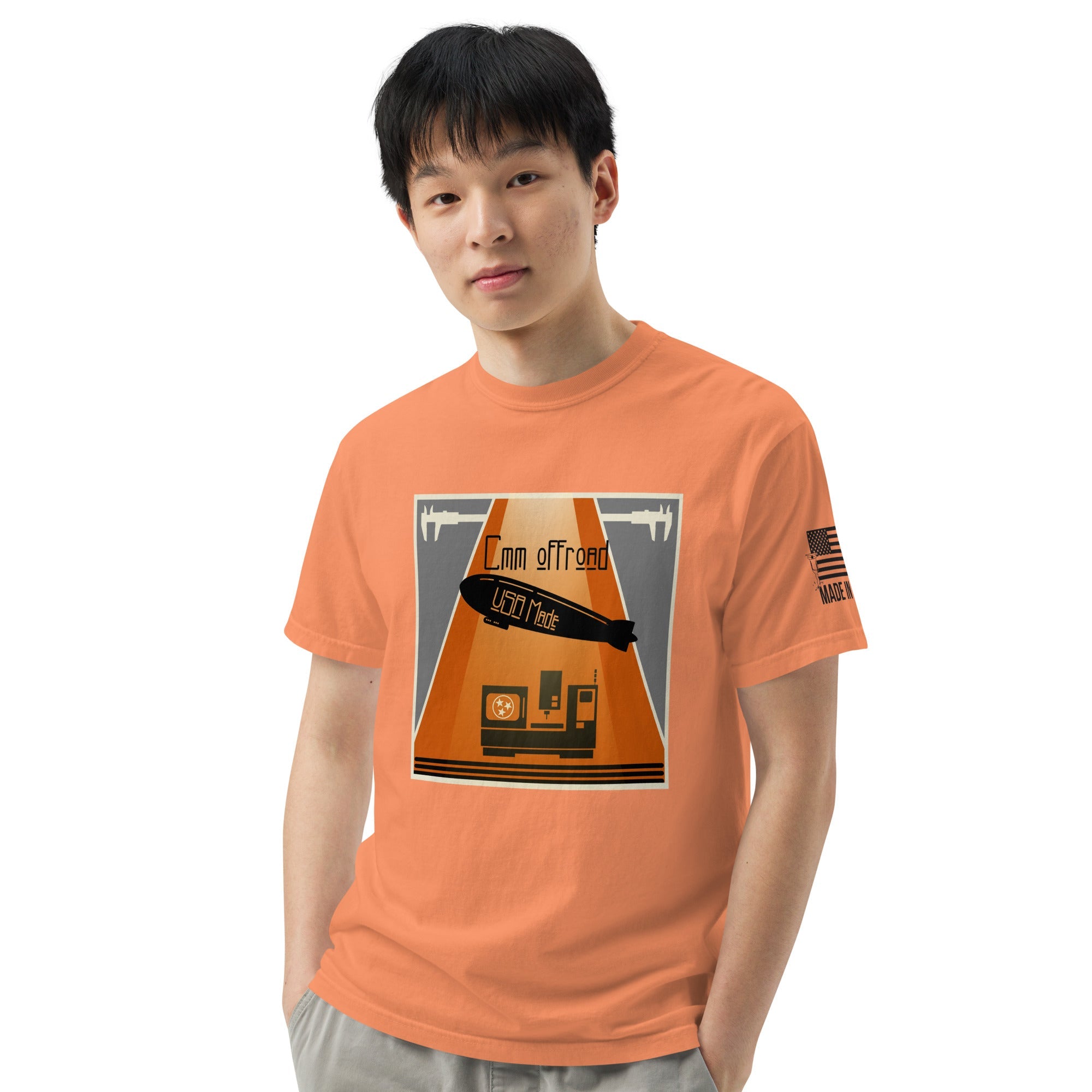 Man wearing terracotta unisex graphic t-shirt with vintage offroad design and USA flag sleeve print