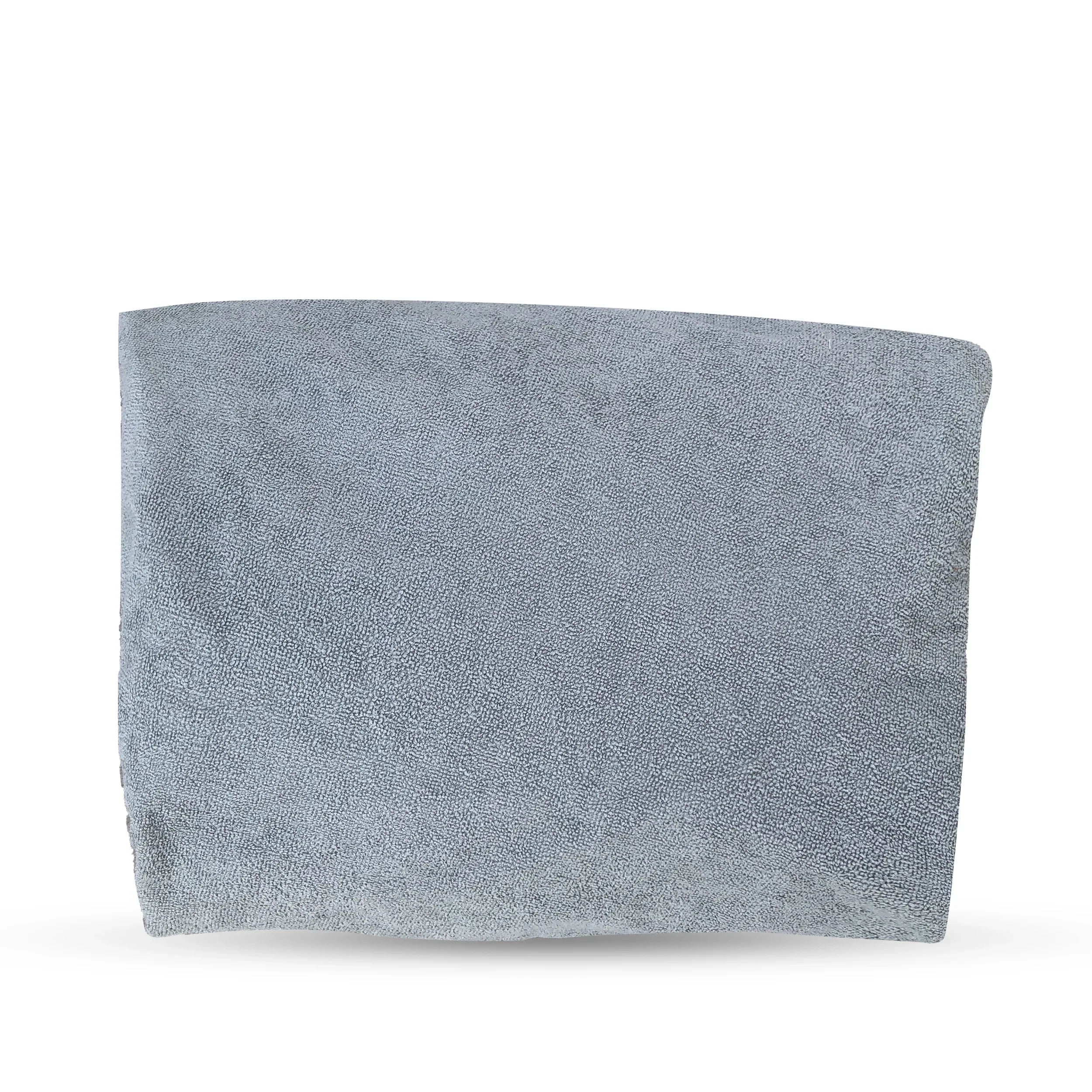 Gray waterproof sheet or blanket folded, ideal for camping and overlanding gear